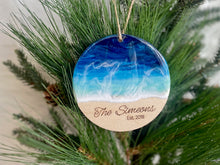 Load image into Gallery viewer, Round beach resin art scene ornament with personalized last name and established date engraved in the sand part
