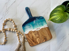 Load image into Gallery viewer, 14” Olive Wood Cheeseboard with Handle, Beach Resin Art Serving Tray
